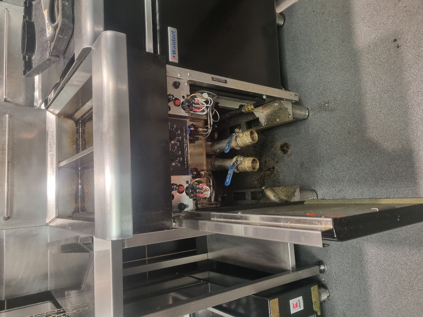 Gas fryer connection in a commercial kitchen