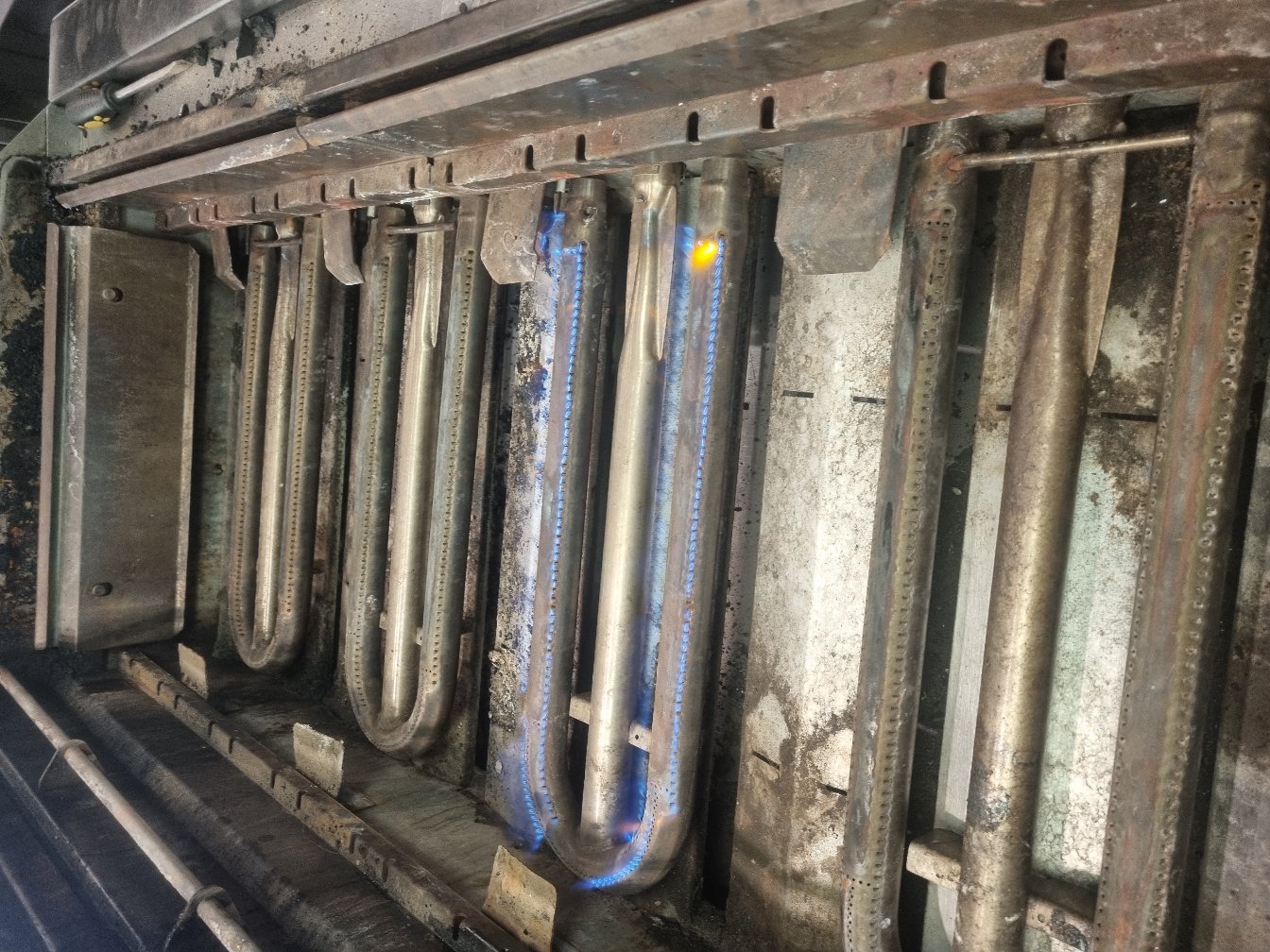 Commercial gas burners lit and running